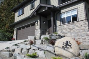 Clopay long panel insulated garage door in the "Octopus Garden"