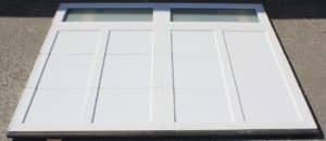 Clopay Coachman garage door in white on sale