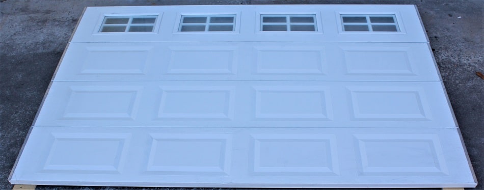 Read more about the article [SALE]Garage door with glass top and inserts 9′ x 6’3″